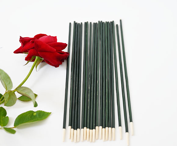 Dyed and waxed bamboo flower garden stick